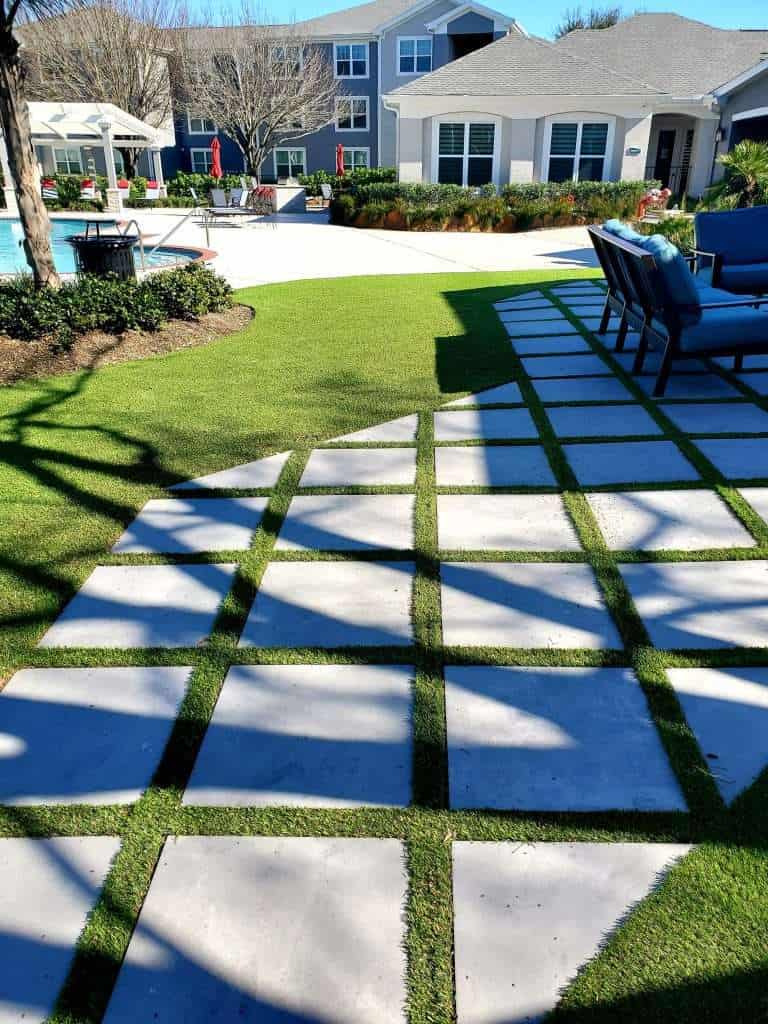 artificial grass between pavers