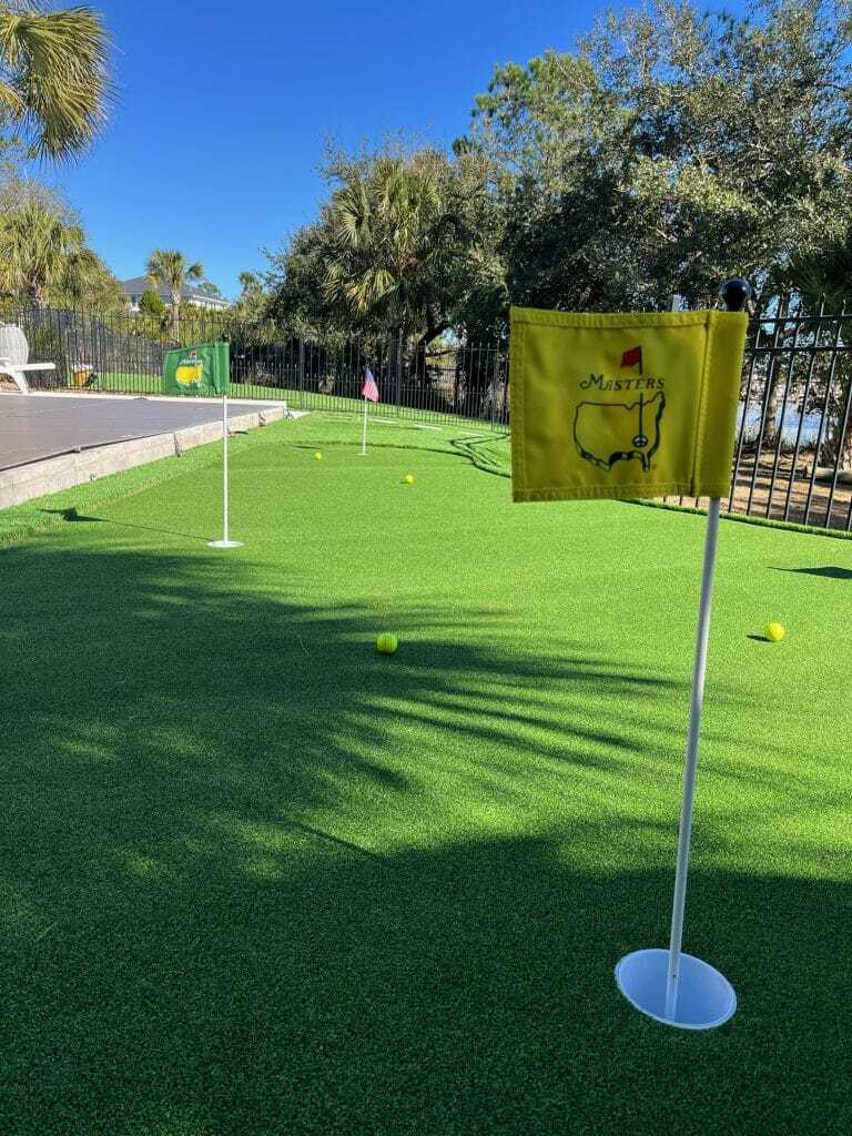 a putting green installed in an Atlanta homes backyard.