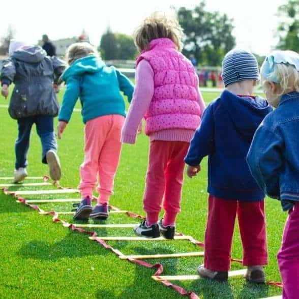 kids playing on artificial turf