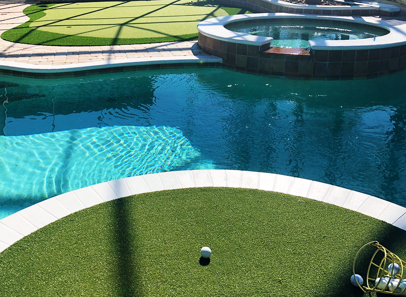 artificial putting green with pool