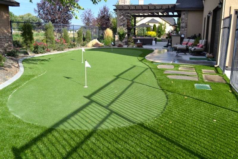 Backyard putting green with 3 holes