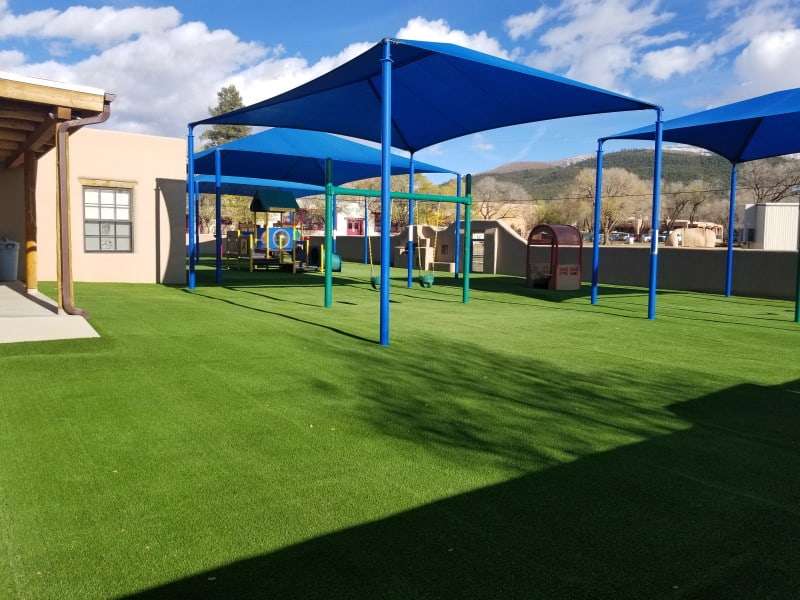 Taos NM Playground on fake grass