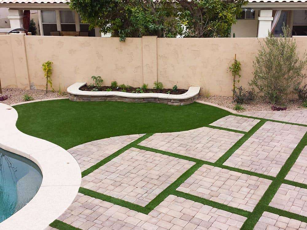 Paver walkway with artificial turf