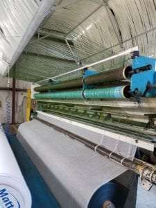 Artificial grass fibers being extruded from high quality resins in ProGreen's Dadeville, Alabama facility.