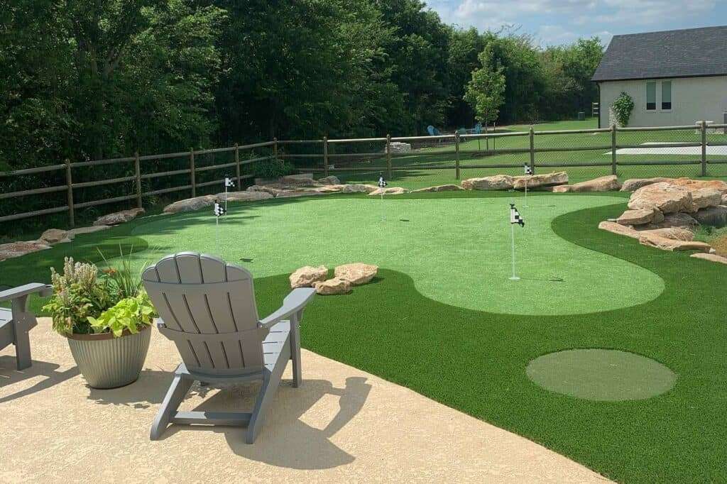 Artificial turf putting green in backyard