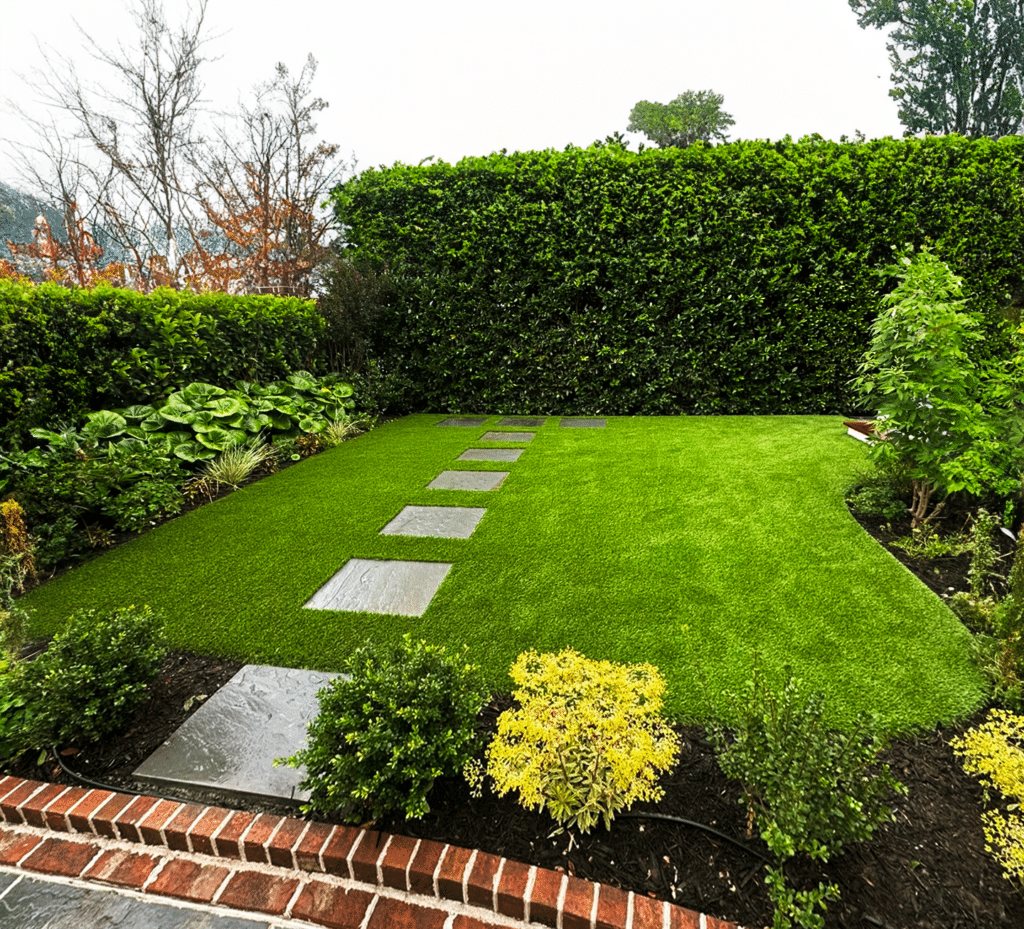 artificial turf yard with pavers