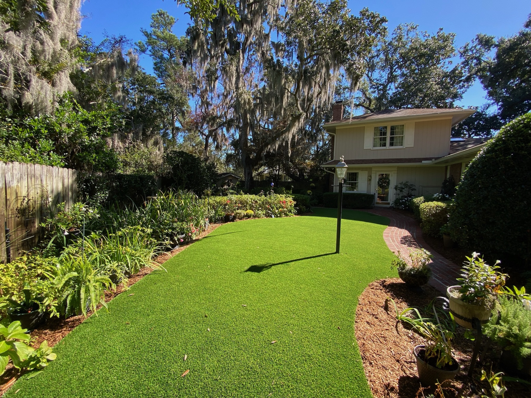 Backyard with artificial grass in Charleston